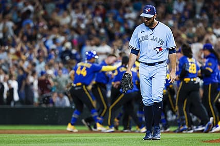 Jul 21, 2023; Seattle, Washington, USA; Toronto Blue Jays first baseman Brandon Belt (13) walks back to the dugout following a 3-2 loss to the Seattle Mariners during the ninth inning at T-Mobile Park. Mandatory Credit: Joe Nicholson-USA TODAY Sports