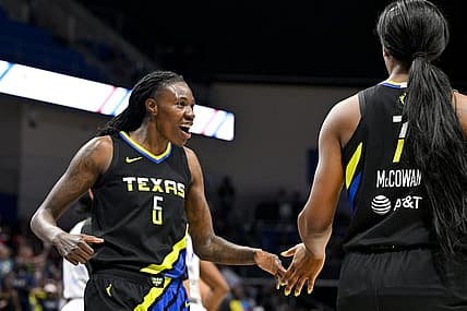 Jul 22, 2023; Arlington, Texas, USA; g6 and center Teaira McCowan (7) celebrate during the second half against the Los Angeles Sparks at College Park Center. Mandatory Credit: Jerome Miron-USA TODAY Sports