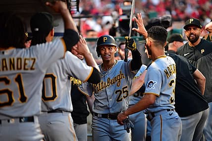 Jul 22, 2023; Anaheim, California, USA; Pittsburgh Pirates catcher Endy Rodriguez (25) celebrates after hitting a solo home run against the Los Angeles Angels during the sixth inning at Angel Stadium. Mandatory Credit: Gary A. Vasquez-USA TODAY Sports