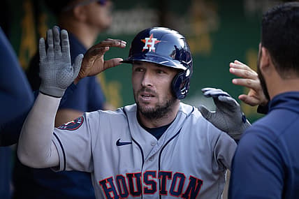 Jul 22, 2023; Oakland, California, USA; Houston Astros third baseman Alex Bregman (2) is greeted by his teammates after hitting a solo home run against the Oakland Athletics during the sixth inning at Oakland-Alameda County Coliseum. Mandatory Credit: D. Ross Cameron-USA TODAY Sports