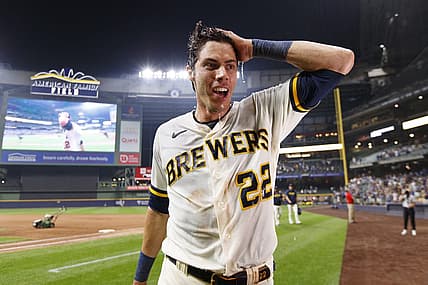 Jul 24, 2023; Milwaukee, Wisconsin, USA;  Milwaukee Brewers left fielder Christian Yelich (22) reacts after being dunked with Gatorade following the game against the Cincinnati Reds at American Family Field. Mandatory Credit: Jeff Hanisch-USA TODAY Sports