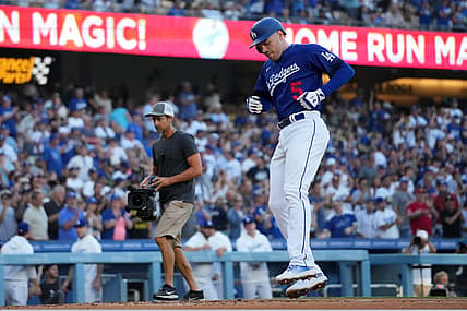 Jul 25, 2023; Los Angeles, California, USA; Los Angeles Dodgers first baseman Freddie Freeman (5) crosses home plate after hitting a solo home run in the first inning against the Toronto Blue Jays at Dodger Stadium. Mandatory Credit: Kirby Lee-USA TODAY Sports