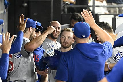 Jul 26, 2023; Chicago, Illinois, USA;  Chicago Cubs left fielder Ian Happ (8), center, celebrates in the dugout after hitting a home run against the Chicago White Sox during the eighth inning at Guaranteed Rate Field. Mandatory Credit: Matt Marton-USA TODAY Sports