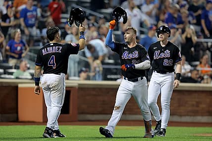 Jul 28, 2023; New York City, New York, USA; New York Mets first baseman Pete Alonso (20) celebrates his three run home run against the Washington Nationals with catcher Francisco Alvarez (4) and third baseman Brett Baty (22) during the fifth inning at Citi Field. Mandatory Credit: Brad Penner-USA TODAY Sports