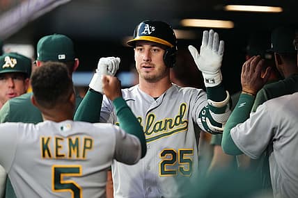Jul 29, 2023; Denver, Colorado, USA; Oakland Athletics designated hitter Brent Rooker (25) following his sacrifice fly scoring run in the sixth inning against the Colorado Rockies at Coors Field. Mandatory Credit: Ron Chenoy-USA TODAY Sports
