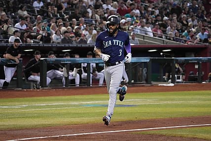 Jul 30, 2023; Phoenix, Arizona, USA; Seattle Mariners shortstop J.P. Crawford (3) runs the bases after hitting a solo home run against the Arizona Diamondbacks during the second inning at Chase Field. Mandatory Credit: Joe Camporeale-USA TODAY Sports