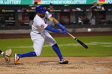 Jul 2, 2023; New York City, New York, USA; New York Mets left fielder Tommy Pham (28) hits an RBI double against the San Francisco Giants during the fourth inning at Citi Field. Mandatory Credit: Gregory Fisher-USA TODAY Sports