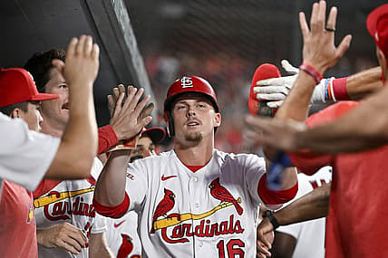 Jul 17, 2023; St. Louis, Missouri, USA;  St. Louis Cardinals pinch hitter Nolan Gorman (16) is congratulated by teammates after scoring against the Miami Marlins during the sixth inning at Busch Stadium. Mandatory Credit: Jeff Curry-USA TODAY Sports