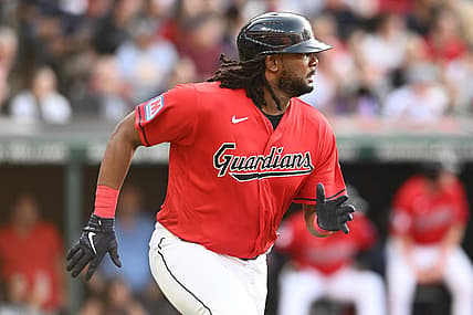 Jul 21, 2023; Cleveland, Ohio, USA; Cleveland Guardians designated hitter Josh Bell (55) hits an RBI double during the first inning against the Philadelphia Phillies at Progressive Field. Mandatory Credit: Ken Blaze-USA TODAY Sports
