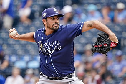 Jul 16, 2023; Kansas City, Missouri, USA; Tampa Bay Rays starting pitcher Zach Eflin (24) delivers a pitch against the Kansas City Royals prior to a game at Kauffman Stadium. Mandatory Credit: Denny Medley-USA TODAY Sports