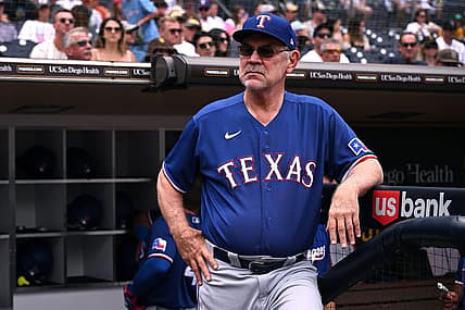 Jul 30, 2023; San Diego, California, USA; Texas Rangers manager Bruce Bochy looks on from the dugout steps before the game against the San Diego Padres at Petco Park. Mandatory Credit: Orlando Ramirez-USA TODAY Sports