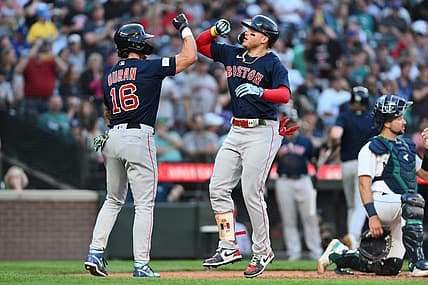 Aug 1, 2023; Seattle, Washington, USA; Boston Red Sox center fielder Jarren Duran (16) and designated hitter Alex Verdugo (99) celebrate after Verdugo hit a two run home run against the Seattle Mariners during the fifth inning at T-Mobile Park. Mandatory Credit: Steven Bisig-USA TODAY Sports