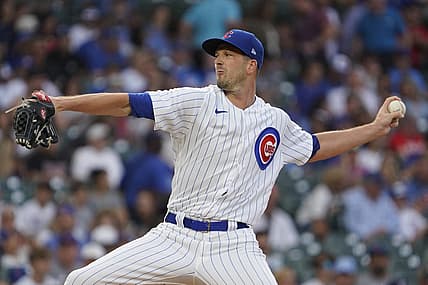 Aug 2, 2023; Chicago, Illinois, USA; Chicago Cubs starting pitcher Drew Smyly (11) throws the ball against the Cincinnati Reds during the first inning at Wrigley Field. Mandatory Credit: David Banks-USA TODAY Sports