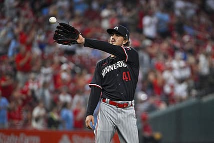 Aug 2, 2023; St. Louis, Missouri, USA;  Minnesota Twins starting pitcher Joe Ryan (41) catches a new baseball after giving up a two run home run to St. Louis Cardinals center fielder Lars Nootbaar (not pictured) during the second inning at Busch Stadium. Mandatory Credit: Jeff Curry-USA TODAY Sports