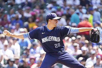 Aug 4, 2023; Chicago, Illinois, USA; Chicago Cubs starting pitcher Kyle Hendricks (28) throws the ball against the Atlanta Braves during the first inning at Wrigley Field. Mandatory Credit: David Banks-USA TODAY Sports