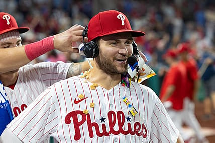 Aug 5, 2023; Philadelphia, Pennsylvania, USA; Philadelphia Phillies shortstop Trea Turner (7) has food and gum and water dumped on him during an interview after a victory against the Kansas City Royals at Citizens Bank Park. Mandatory Credit: Bill Streicher-USA TODAY Sports
