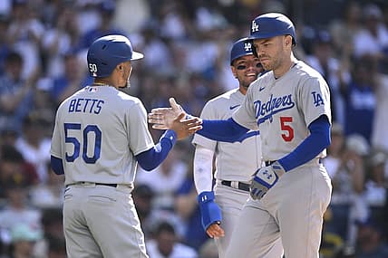 Aug 6, 2023; San Diego, California, USA; Los Angeles Dodgers first baseman Freddie Freeman (5) is congratulated by right fielder Mookie Betts (50) after hitting a two-run home run during the second inning against the San Diego Padres at Petco Park. Mandatory Credit: Orlando Ramirez-USA TODAY Sports