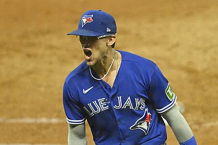 Aug 7, 2023; Cleveland, Ohio, USA; Toronto Blue Jays second baseman Cavan Biggio (8) reacts after completing an unassisted double play in the eighth inning against the Cleveland Guardians at Progressive Field. Mandatory Credit: David Richard-USA TODAY Sports