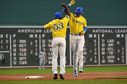 Aug 9, 2023; Boston, Massachusetts, USA;Boston Red Sox first baseman Triston Casas (36) celebrates his home run against the Kansas City Royals with third base coach Carlos Febles (53)  during the second inning at Fenway Park. Mandatory Credit: Eric Canha-USA TODAY Sports