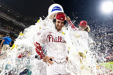 Aug 9, 2023; Philadelphia, Pennsylvania, USA; Philadelphia Phillies starting pitcher Michael Lorenzen (22) is doused with water by first baseman Alec Bohm (28) after pitching a no hit victory against the Washington Nationals at Citizens Bank Park. Mandatory Credit: Bill Streicher-USA TODAY Sports