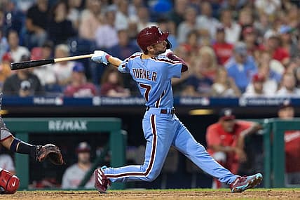 Aug 10, 2023; Philadelphia, Pennsylvania, USA; Philadelphia Phillies shortstop Trea Turner (7) hits a two RBI home run during the sixth inning against the Washington Nationals at Citizens Bank Park. Mandatory Credit: Bill Streicher-USA TODAY Sports
