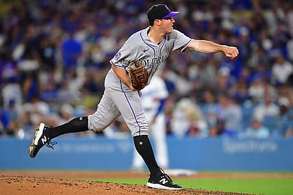 Aug 10, 2023; Los Angeles, California, USA; Colorado Rockies relief pitcher Ty Blach (50) throws against the Los Angeles Dodgers during the sixth inning at Dodger Stadium. Mandatory Credit: Gary A. Vasquez-USA TODAY Sports