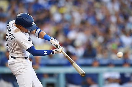 Aug 12, 2023; Los Angeles, California, USA; Los Angeles Dodgers shortstop Enrique Hernandez (8) doubles against the Colorado Rockies during the second inning at Dodger Stadium. Mandatory Credit: Jonathan Hui-USA TODAY Sports