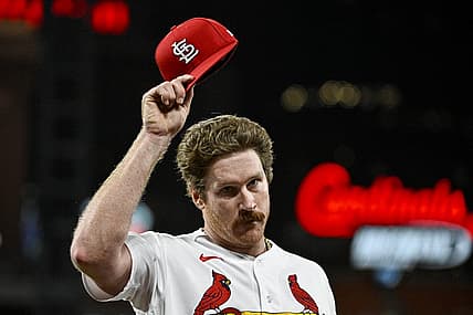 Aug 14, 2023; St. Louis, Missouri, USA;  St. Louis Cardinals starting pitcher Miles Mikolas (39) tips his cap to the fans as he walks off the field after he was removed from the game during the seventh inning against the Oakland Athletics at Busch Stadium. Mandatory Credit: Jeff Curry-USA TODAY Sports