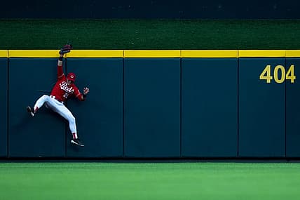 Cincinnati Reds left fielder TJ Friedl (29) catches a fly ball hit by Cleveland Guardians right fielder Ramon Laureano (10) in the third inning of the MLB baseball game between the Cincinnati Reds and the Cleveland Guardians at Great American Ball Park in Cincinnati on Wednesday, Aug. 16, 2023.
