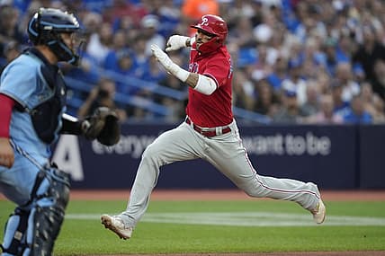 Aug 16, 2023; Toronto, Ontario, CAN; Philadelphia Phillies right fielder Nick Castellanos (8) scores against the Toronto Blue Jays on a sacrifice fly by Philadelphia Phillies left fielder Jake Cave (not pictured) during the second inning at Rogers Centre. Mandatory Credit: John E. Sokolowski-USA TODAY Sports