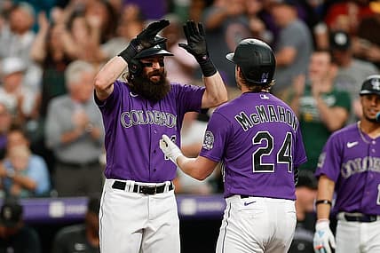 Aug 18, 2023; Denver, Colorado, USA; Colorado Rockies right fielder Charlie Blackmon (19) celebrates the three run home run of third baseman Ryan McMahon (24) in the fourth inning against the Chicago White Sox at Coors Field. Mandatory Credit: Isaiah J. Downing-USA TODAY Sports