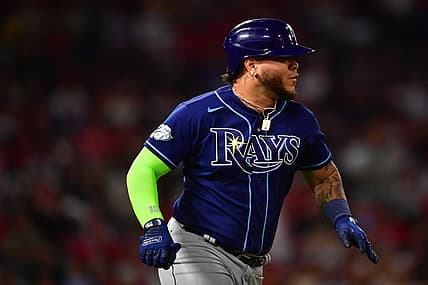 Aug 18, 2023; Anaheim, California, USA; Tampa Bay Rays designated hitter Harold Ramirez (43) runs after hitting an RBI single against the Los Angeles Angels during the seventh inning at Angel Stadium. Mandatory Credit: Gary A. Vasquez-USA TODAY Sports