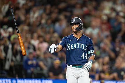 Aug 9, 2023; Seattle, Washington, USA; Seattle Mariners centerfielder Julio Rodriguez (44) tosses his bat after earning a walk against the San Diego Padres at T-Mobile Park. Mandatory Credit: Stephen Brashear-USA TODAY Sports