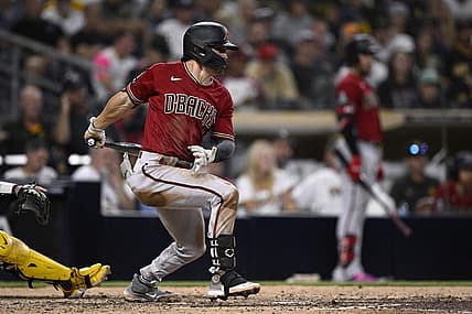 Aug 19, 2023; San Diego, California, USA; Arizona Diamondbacks right fielder Corbin Carroll (7) hits an RBI single against the San Diego Padres during the sixth inning at Petco Park. Mandatory Credit: Orlando Ramirez-USA TODAY Sports