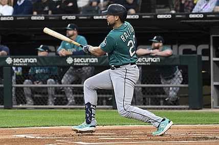 Aug 21, 2023; Chicago, Illinois, USA;  Seattle Mariners first baseman Ty France (23) hits a two RBI double against the Chicago White Sox during the first inning at Guaranteed Rate Field. Mandatory Credit: Matt Marton-USA TODAY Sports