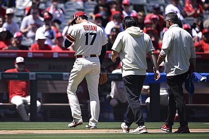Aug 23, 2023; Anaheim, California, USA; Los Angeles Angels starting pitcher Shohei Ohtani (17) leaves the field during the second inning against the Cincinnati Reds at Angel Stadium. Mandatory Credit: Orlando Ramirez-USA TODAY Sports