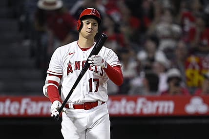 Aug 23, 2023; Anaheim, California, USA; Los Angeles Angels designated hitter Shohei Ohtani (17) looks at his bat during the ninth inning against the Cincinnati Reds at Angel Stadium. Mandatory Credit: Orlando Ramirez-USA TODAY Sports