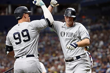 Aug 25, 2023; St. Petersburg, Florida, USA; New York Yankees third baseman DJ LeMahieu (26) celebrates with right fielder Aaron Judge (99) after he hit a home run against the Tampa Bay Rays during the fifth inning at Tropicana Field. Mandatory Credit: Kim Klement Neitzel-USA TODAY Sports