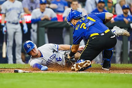 Aug 25, 2023; Seattle, Washington, USA; Seattle Mariners catcher Cal Raleigh (29) tags out Kansas City Royals center fielder Drew Waters (6) during the second inning at T-Mobile Park. Mandatory Credit: Joe Nicholson-USA TODAY Sports