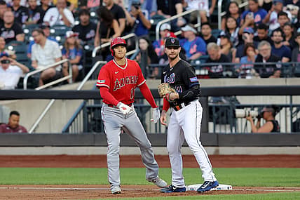 Aug 25, 2023; New York City, New York, USA; Los Angeles Angels designated hitter Shohei Ohtani (17) takes a lead off first base against New York Mets first baseman Pete Alonso (20) after walking during the first inning at Citi Field. Mandatory Credit: Brad Penner-USA TODAY Sports