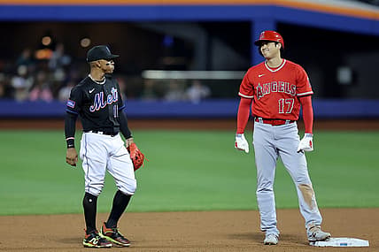 Aug 25, 2023; New York City, New York, USA; Los Angeles Angels designated hitter Shohei Ohtani (17) talks to New York Mets shortstop Francisco Lindor (12) at second base during the fifth inning at Citi Field. Mandatory Credit: Brad Penner-USA TODAY Sports