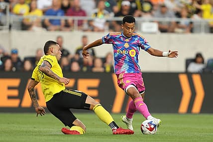 Aug 26, 2023; Columbus, Ohio, USA; Toronto FC midfielder Brandon Servania (23) in action against Columbus Crew SC forward Christian Ramirez (17) during the first half at Lower.com Field. Mandatory Credit: Joseph Maiorana-USA TODAY Sports