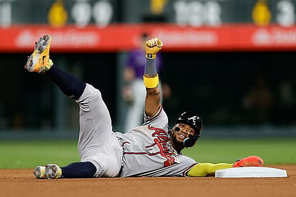 Aug 28, 2023; Denver, Colorado, USA; Atlanta Braves right fielder Ronald Acuna Jr. (13) reacts after stealing second in the seventh inning against the Colorado Rockies at Coors Field. Mandatory Credit: Isaiah J. Downing-USA TODAY Sports