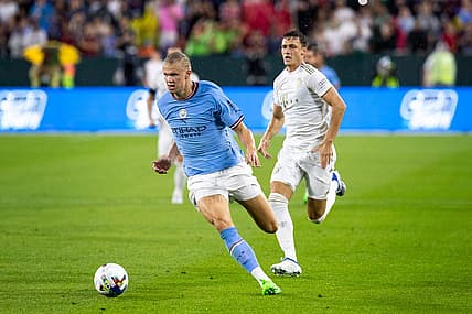 Manchester City forward Erling Haaland (9) runs the ball during the exhibition match against FC Bayern Munich on Saturday, July 23, 2022, at Lambeau Field in Green Bay, Wis.

Gpg Bayern Man City Match 7232022 0014