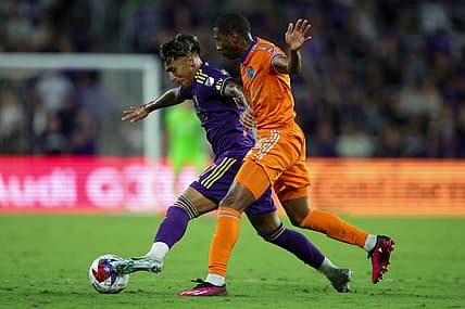 Mar 4, 2023; Orlando, Florida, USA;  Orlando City SC forward Facundo Torres (17) controls the ball from FC Cincinnati defender Ray Gaddis (28) in the second half at Exploria Stadium. Mandatory Credit: Nathan Ray Seebeck-USA TODAY Sports