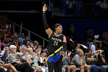 Jul 22, 2023; Arlington, Texas, USA; Dallas Wings guard Arike Ogunbowale (24) celebrates during the second half against the Los Angeles Sparks at College Park Center. Mandatory Credit: Jerome Miron-USA TODAY Sports