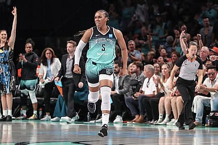 Aug 6, 2023; Brooklyn, New York, USA;  New York Liberty forward Kayla Thornton (5) celebrates after making a three point shot in the third quarter against the Las Vegas Aces at Barclays Center. Mandatory Credit: Wendell Cruz-USA TODAY Sports