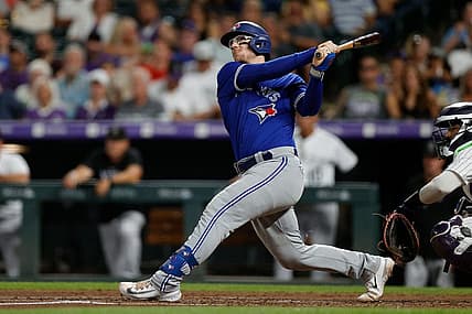 Sep 1, 2023; Denver, Colorado, USA; Toronto Blue Jays catcher Danny Jansen (9) watches his ball on a two run home run in the sixth inning against the Colorado Rockies at Coors Field. Mandatory Credit: Isaiah J. Downing-USA TODAY Sports