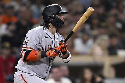 Sep 1, 2023; San Diego, California, USA; San Francisco Giants shortstop Brandon Crawford (35) hits a sacrifice fly against the San Diego Padres during the fourth inning at Petco Park. Mandatory Credit: Orlando Ramirez-USA TODAY Sports