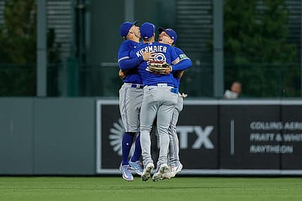 Sep 1, 2023; Denver, Colorado, USA; Toronto Blue Jays center fielder Kevin Kiermaier (39) and right fielder George Springer (4) and left fielder Daulton Varsho (25) celebrate after the game against the Colorado Rockies at Coors Field. Mandatory Credit: Isaiah J. Downing-USA TODAY Sports